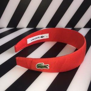 Lacoste orange headband.